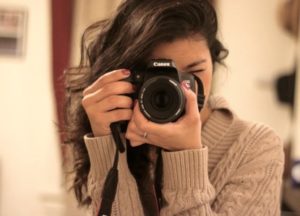 woman holding camera